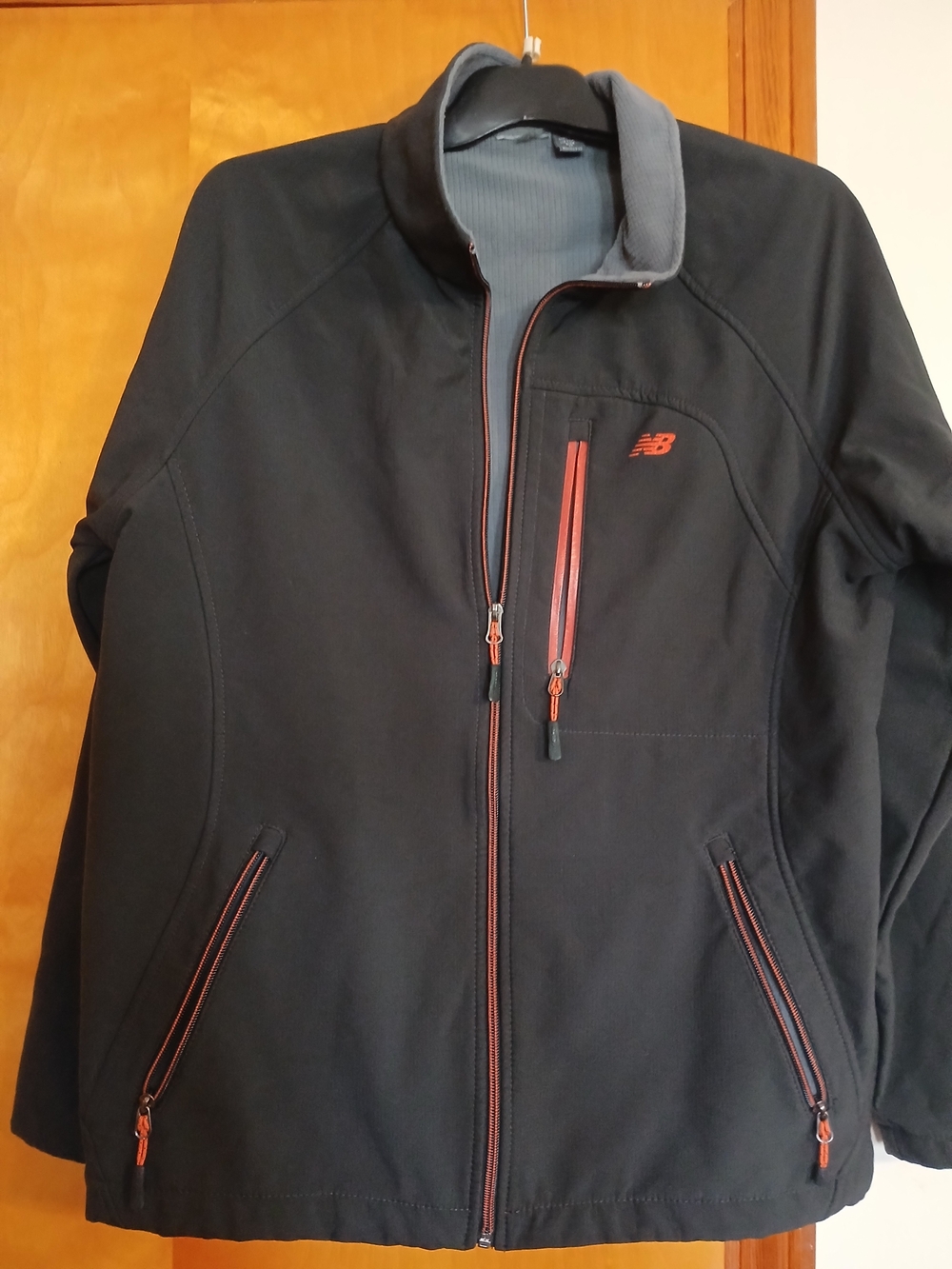 New Balance Men’s Black Softshell Jacket with Red Accents